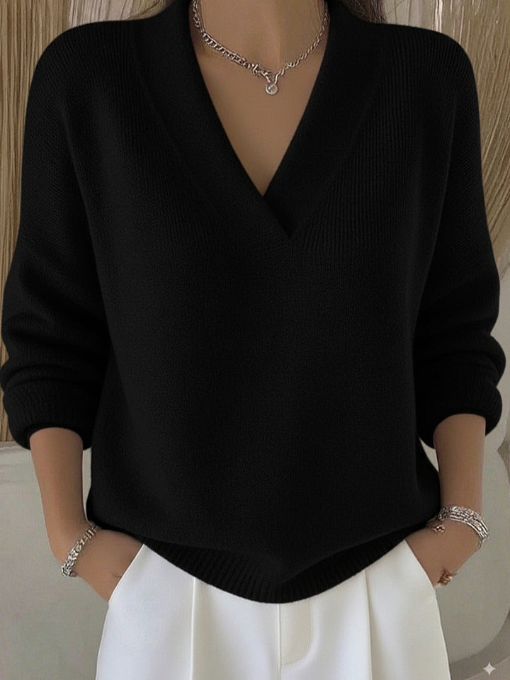 Relaxed Knit Sweater with Deep V-Neckline and Ribbed Hem